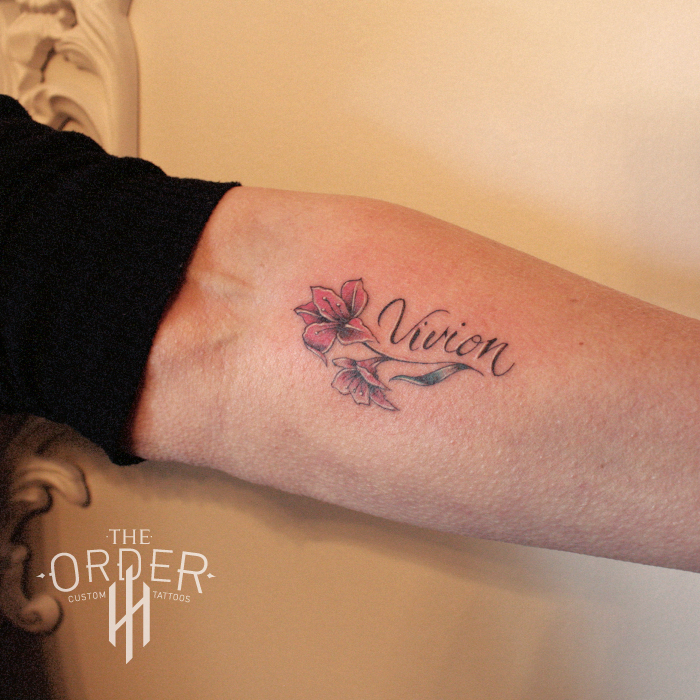 Color Flower With Name Tattoo – The Order