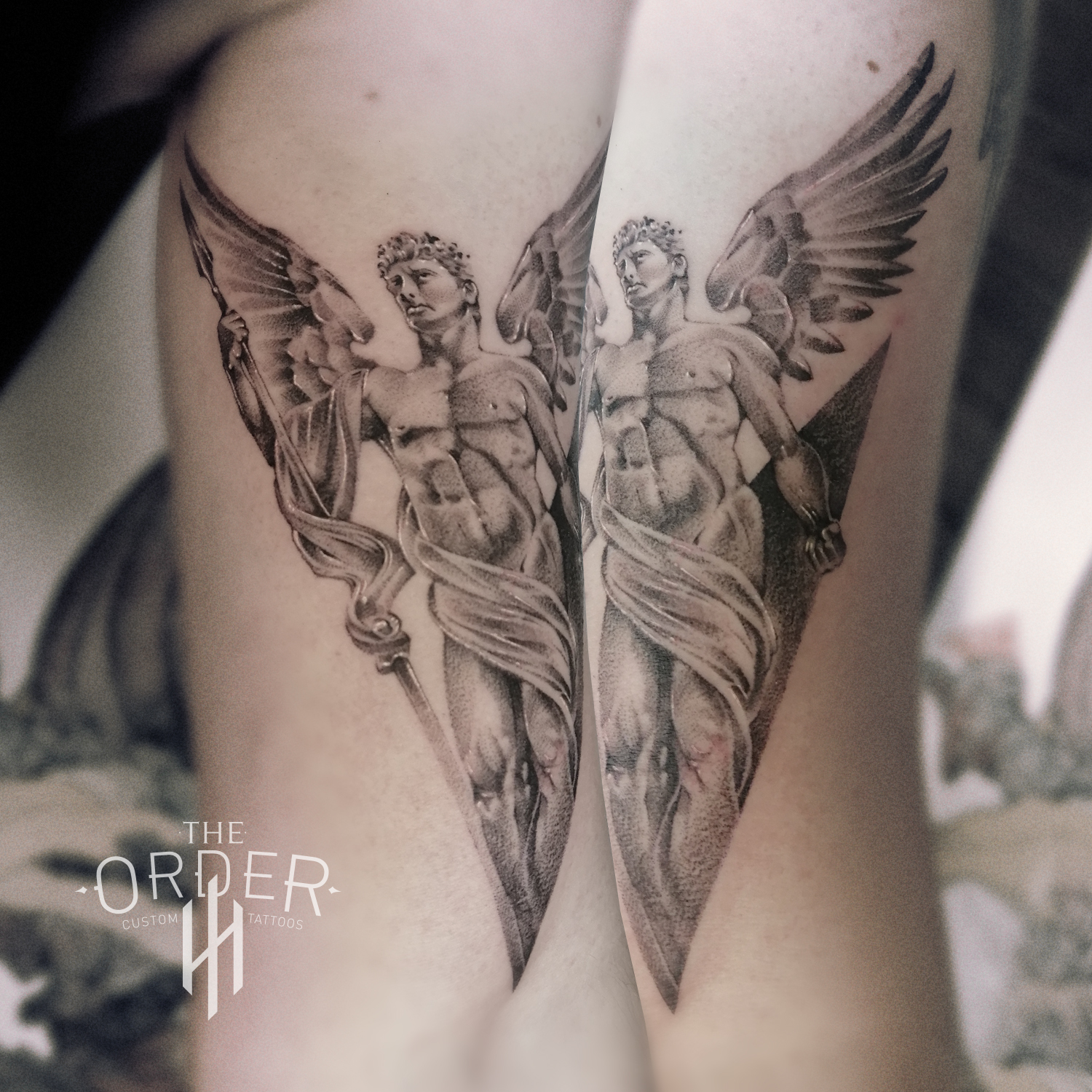 Statue Tattoo – The Order Custom Tattoos